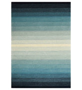 Blue gradient hand-tufted wool rug with ombre striped design